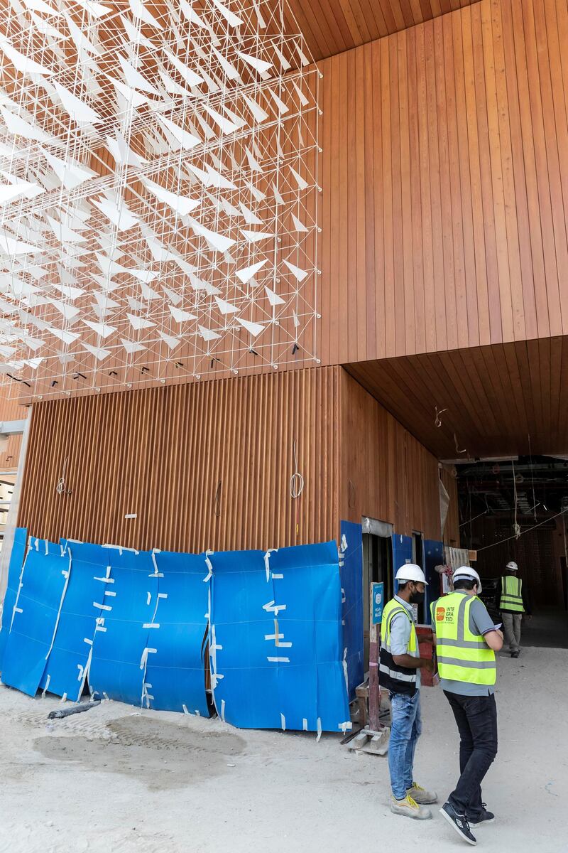 The Polish pavilion at the EXPO 2021 site nears completion. The pavilion has metal birds on the outside and inside that are partially installed along with a special wood panelled interior and exterior on May 2nd, 2021. 
Antonie Robertson / The National.
Reporter: Ramola Talwar for National