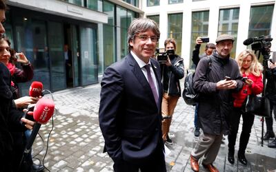 Former Catalan leader Carles Puigdemont leaves free a prosecutor office at the Justice Palace after handing himself to police in Brussels, Belgium October 18, 2019. REUTERS/Francois Lenoir