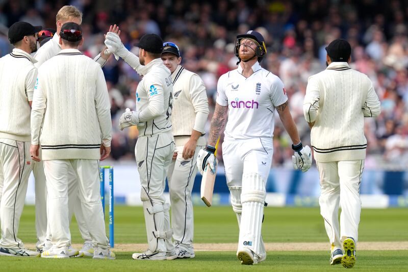 Kyle Jamieson and teammates celebrate taking the wicket of England's Ben Stokes. AP
