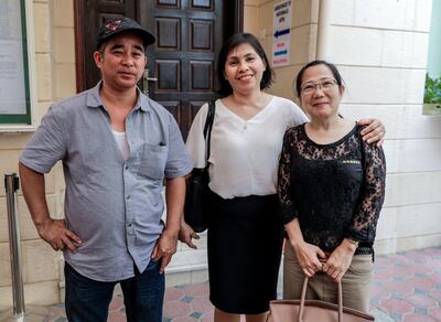Abu Dhabi, April 13, 2019.  Senatorial election voters at the AUH Philippine Embassy. --  (L-R)  Reynaldo Delos Reyes, 48, Welder from Mindoro Philippines.; Merybeth Kuizon. 48,Housemaid from South Cotabato, Philippines.; Lida Detros, 45, Petcare Specialist from Cebu, Philippines.
Victor Besa/The National.
Section:  NA 
Reporter:  Haneen Dajani