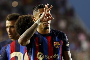 FORT LAUDERDALE, FLORIDA - JULY 19: Raphinha #22 of FC Barcelona celebrates after scoring his team's second goal against Inter Miami CF during the first half of a preseason friendly at DRV PNK Stadium on July 19, 2022 in Fort Lauderdale, Florida.    Michael Reaves / Getty Images / AFP
