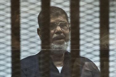 Mohammed Morsi on trial in Cairo in 2015. AFP