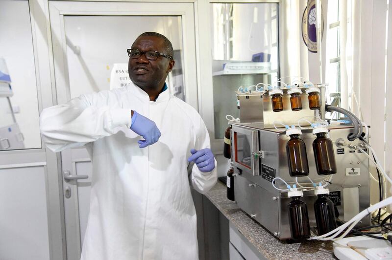 Professor Christian Happi, the director of the African Centre of Excellence for Genomics of Infectious Diseases, speaks about facilities in the laboratory during an inspection at the centre located at the Redeemer’s University in Ede, south-western Nigeria last month. AFP