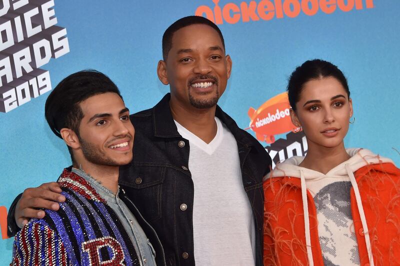 US actor Will Smith (C), English actress Naomi Scott (R) and Canadian actor Mena Massoud arrive for the 32nd Annual Nickelodeon Kids' Choice Awards at the USC Galen Center on March 23, 2019 in Los Angeles. / AFP / Chris Delmas
