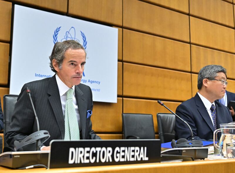 Rafael Grossi, director general of the IAEA, left, and UN ambassador Wang Qun in Vienna on June 6. AFP