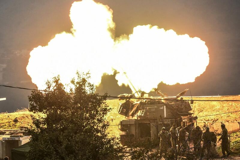 Israeli troops fire shells into Lebanon, after Hizbollah claimed a bomb attack on an Israeli military border patrol near the Shebaa Farms area on January 4, 2016.  Ancho Gosh / Jinipix / Reuters