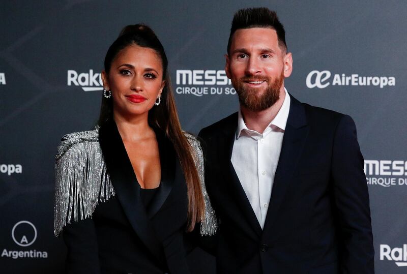 Messi poses with wife Antonella. Reuters