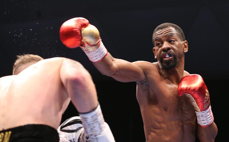 Jamel Herring of the US in action against Carl Frampton of Northern Ireland.