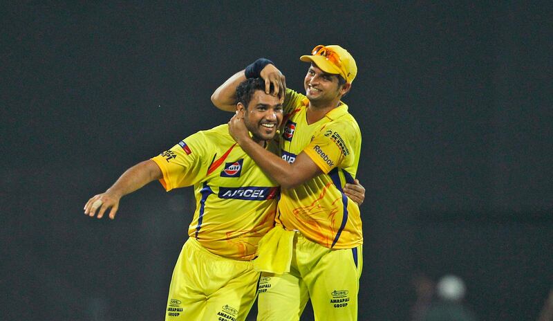 Chennai Super Kings' Shadab Jakati, left, celebrates with teammate Suresh Raina the dismissal of Royal Challengers Bangalore's Luke Pomersbach, not seen, during their Indian Premier League final cricket match in Chennai, India, Saturday, May 28, 2011. (AP Photo/Aijaz Rahi) *** Local Caption ***  DEL176_India_IPL_Cricket.jpg