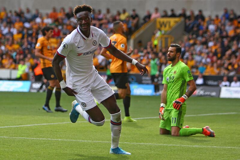 Chelsea's English striker Tammy Abraham celebrates after scoring their fourth goal and his third in a 5-2 win for Chelsea against Wolves at Molineux. AFP