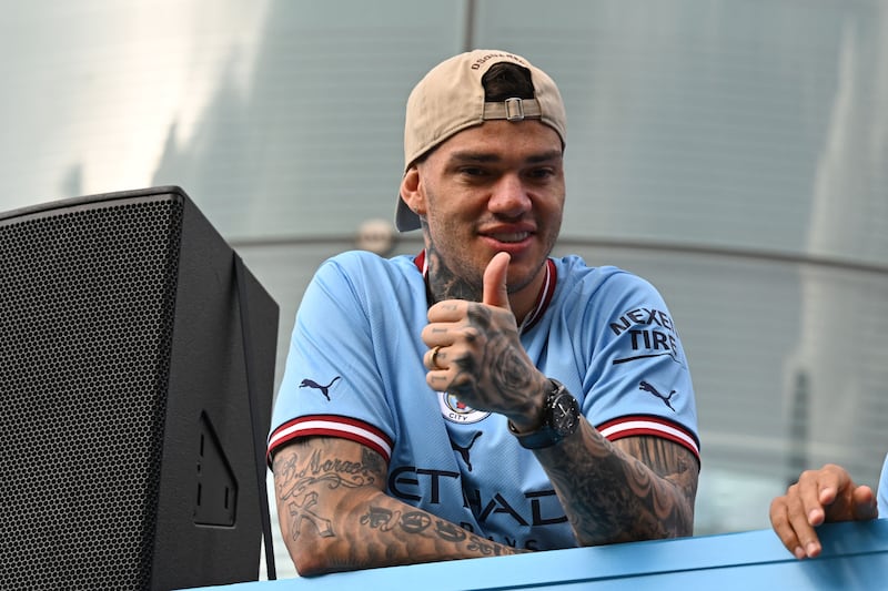 City goalkeeper Ederson gives thumbs up to fans. AFP