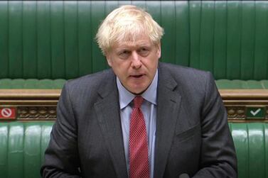 Britain's Prime Minister Boris Johnson makes a statement to MPs in the House of Commons on the latest situation with the coronavirus pandemic in London, Wednesday, September 22, 2020. House of Commons/PA via AP