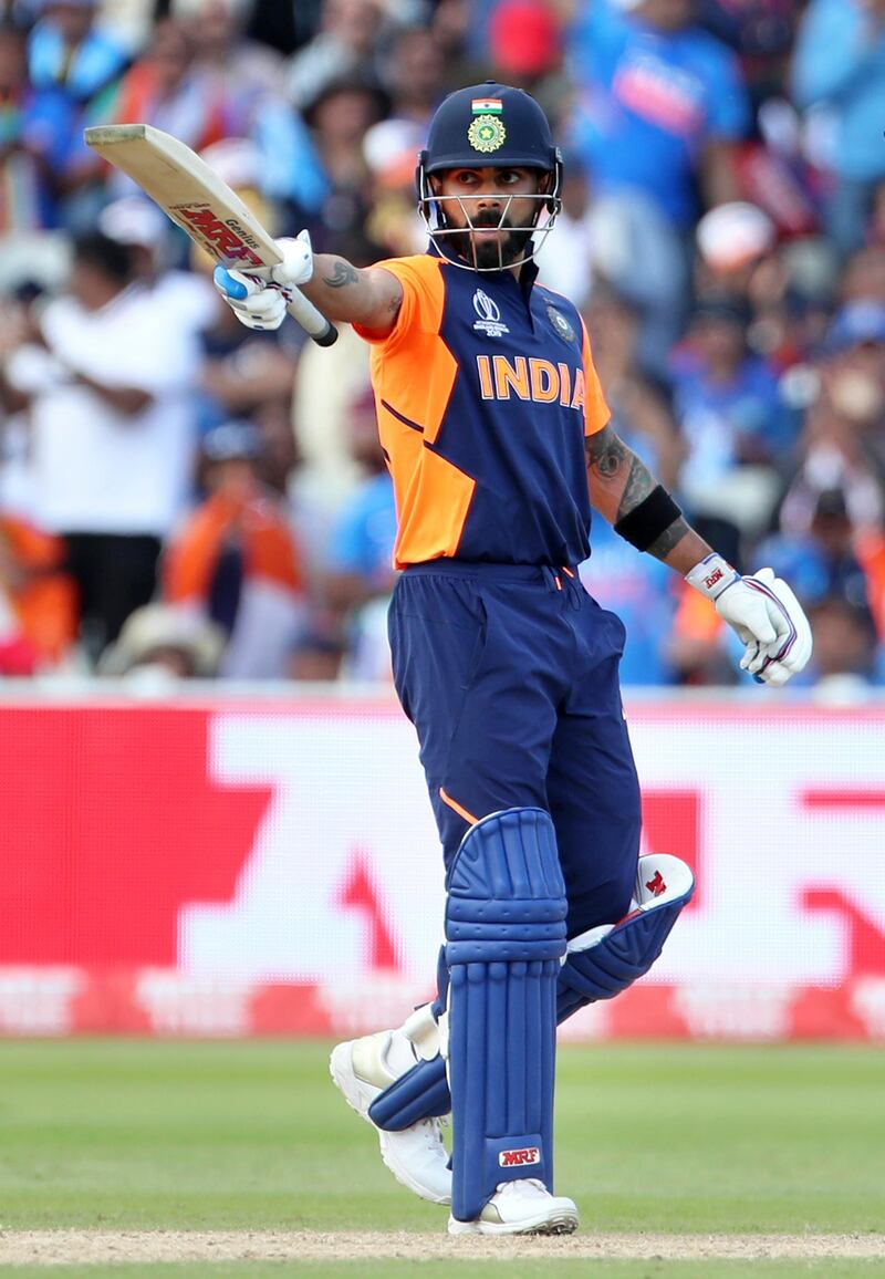 Virat Kohli (7/10): The captain marshalled his team even as England's batsmen were going hell for leather. He batted well, too, scoring a half-century and getting a good partnership going with Rohit. But his dismissal was the first nail in the coffin for India's run chase. AP Photo