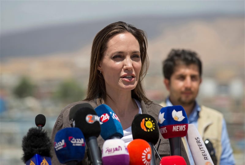 Special Envoy of the United Nations High Commissioner for Refugees (UNHCR), Angelina Jolie, gives a press conference in the Domiz camp for Syrian refugees, near the town of Dohuk, northern Kurdistan, Iraq, Sunday, June 17, 2018. (AP Photo/Claire Thomas)