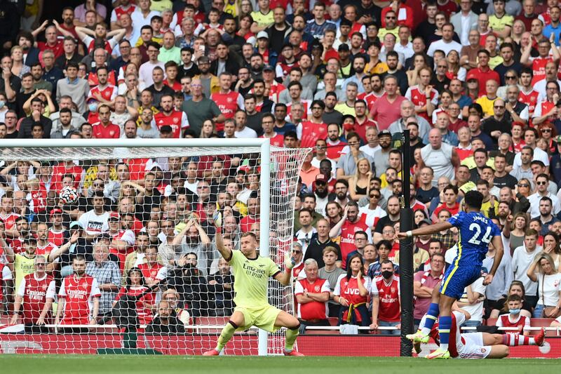 Reece James shoots past Arsenal goalkeeper Bernd Leno to make it 2-0. AFP