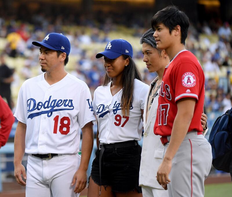 Maeda of the Los Angeles Dodgers, Naomi Osaka, Miyavi and Shohei Ohtani of the Los Angeles Angels pose together. AFP
