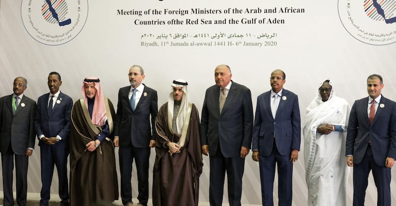 Participants in a meeting for Arab and African countries of the Red Sea and Gulf of Aden (R to L), Foreign Ministers of Yemen Mohammad Al-Hadhrami, Sudan Asma Mohamed Abdalla, Djibouti Mahmoud Ali Youssouf, Egypt Sameh Shoukry, Saudi Arabia Faisal bin Farhan, Jordan Ayman Safadi, Saudi Minister of State for African Affairs Ahmed bin Abdul Aziz Kattan, Foreign ministers of Somalia Ahmed Isse Awad and Eritrea Osman Saleh Mohammed, pose for a group picture ahead of a meeting in the Saudi capital Riyadh on January 6, 2020. / AFP / FAYEZ NURELDINE
