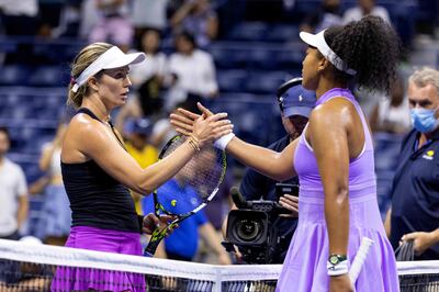 Danielle Collins and Naomi Osaka greet each other at the net following their US Open first round match. AFP