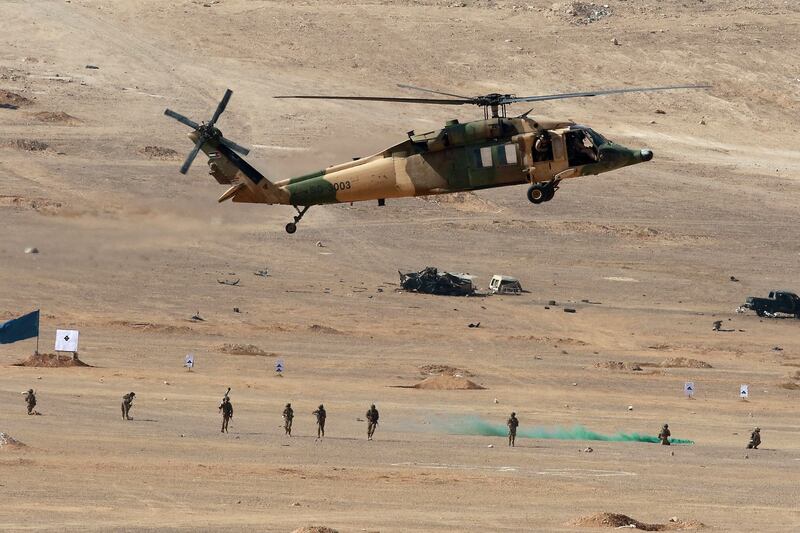 A Black Hawk helicopter flies over the site. AFP