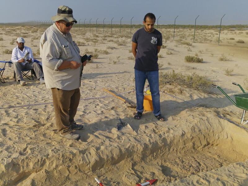 Ahmed Al Haj and Dr Mark Beech, both from Abu Dhabi Tourism and Culture Authority and Fadhl Al Eryani, an NYUAD student, at a dig on Saadiyat. Investigations have unearthed evidence of settlements from the 18th and 19th century. Courtesy Dr Robert Parthesius