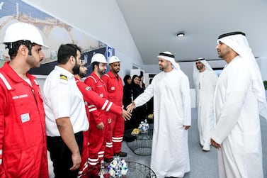 Adnoc Logistics & Services employees during a visit of Abu Dhabi Department of Transport chairman Sheikh Theyab bin Mohamed bin Zayed Al Nahyan. The firm completed full integration of three units last year. Source: Adnoc