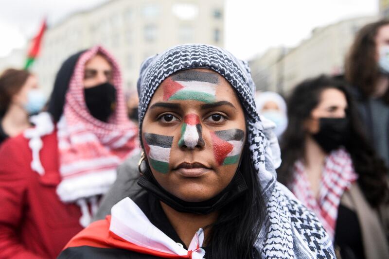 A pro-Palestine supporter takes part in a protest in Brussels, Belgium. Reuters