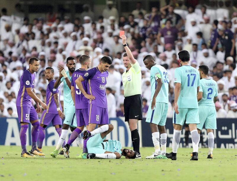 Al Ain, United Arab Emirates - August 21st, 2017: Al Ain's Mohnad Salem is sent off during the Asian Champions League game between Al Ain v Al Hilal. Monday, August 21st, 2017 at Hazza Bin Zayed Stadium, Al Ain. Chris Whiteoak / The National