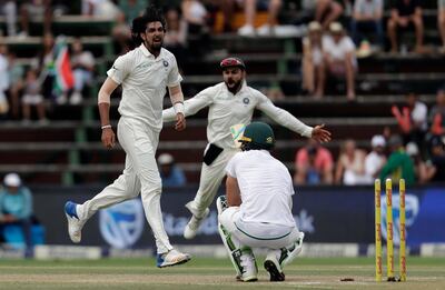 India's bowler Ishant Sharma, left, with captain Virat Kohli reacts after bowling South Africa's captain Faf du Plessisâ€š for 2 runs on the fourth day of the third cricket test match between South Africa and India at the Wanderers Stadium in Johannesburg, South Africa, Saturday, Jan. 27, 2018. (AP Photo/Themba Hadebe)