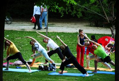 MADRID, SPAIN - MAY 20: People practise Asanas Yoga  in the famous Parque Del Retiro in Madrid on May 20, 2010 in Madrid, Spain. Madrid is a big european city with more than 3 million inhabitants.  (Photo by EyesWideOpen/Getty Images)