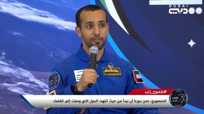 Hazza Al Mansouri speaks during a press conference at the Presidential Airport in Abu Dhabi on Saturday. Courtesy Dubai TV