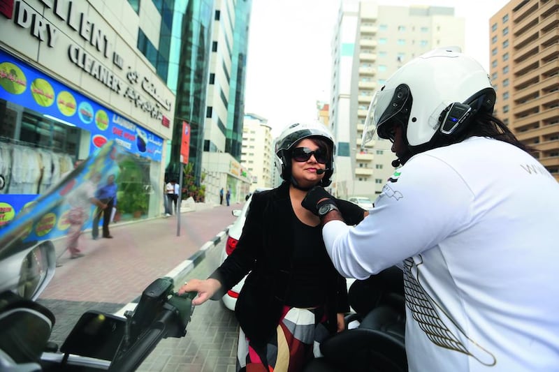 Tahira Yaqoob and her driver Jamshaid Ghulam tour around Dubai on a Honda Gold Wing as part of the motorcycle and trike services offered by FlyBike, which is a new company that is operating in the city. Sarah Dea / The National