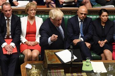 Britain's Prime Minister Boris Johnson (C) gesturing while answering questions on the proroguing of Parliament, in the House of Commons in London. AFP/Jessica Taylor /UK Parliament