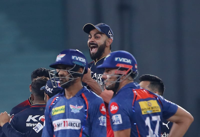 Royal Challengers Bangalore's Virat Kohli celebrates the wicket of Lucknow Super Giants' Deepak Hooda. AP Photo