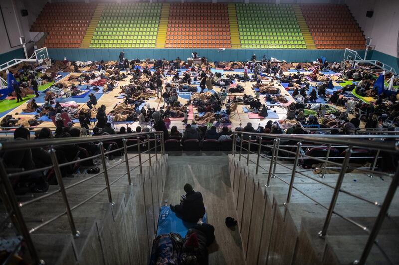 Earthquake survivors spend the night in a sports hall in Elazig, Turkey. Getty Images