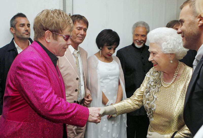Queen Elizabeth meets Sir Elton backstage at the Diamond Jubilee Concert 2022 outside Buckingham Palace, London. PA