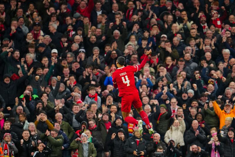 Liverpool's Virgil van Dijk celebrates after scoring against Norwich City in the FA Cup fourth round on Monday. AP