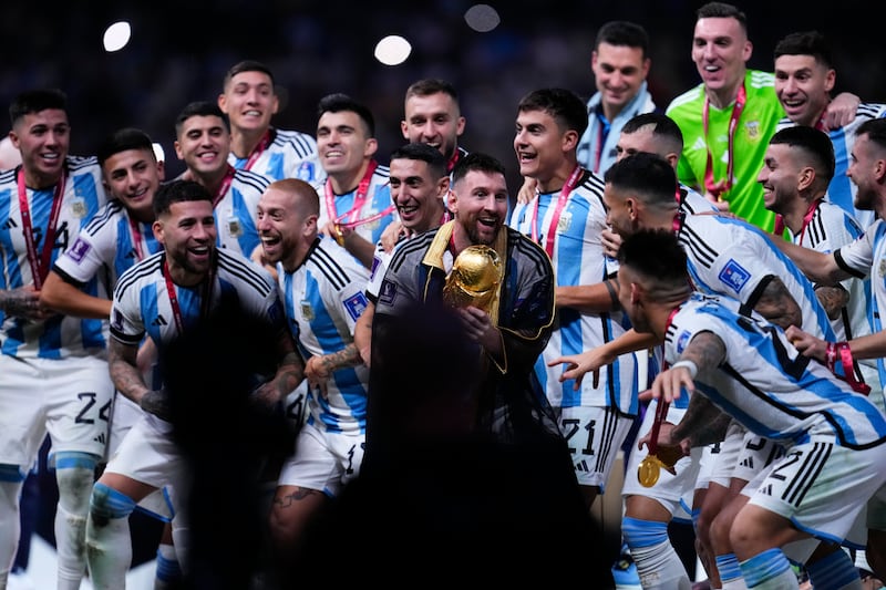 Argentina's Lionel Messi celebrates with teammates after beating France. AP