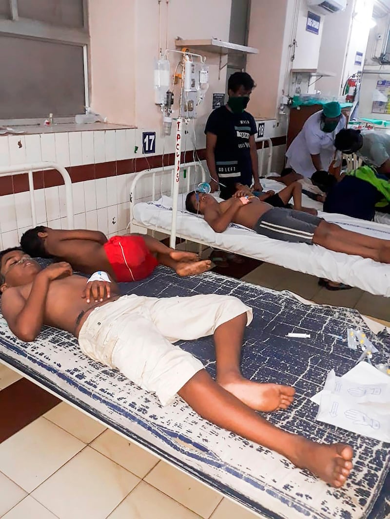 Staff attend to children affected by a gas leak from the LG Polymers plant at the King George hospital in Visakhapatnam. AFP