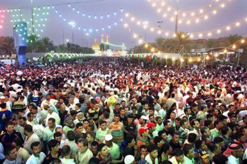 Thousands of Iraqi Shiite pilgrims gather near the Imam Abbas shrine in Karbala to commemorate the birth of Imam Mahdi, revered by Shiites. Mohammad Sawaf / AFP Photo