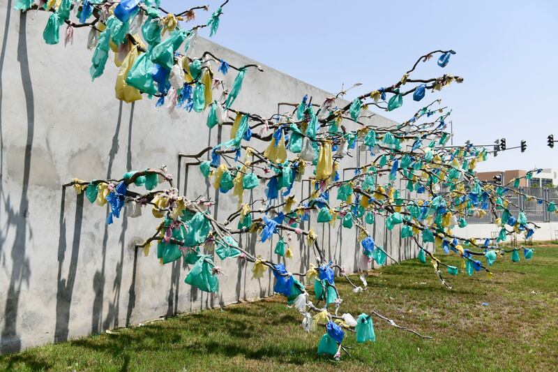 A plastic tree by Cameroonian artist Pascale Marthine Tayou at the Special Olympics Gardens. Khushnum Bhandari / The National