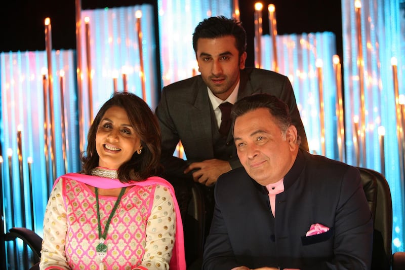 MUMBAI, INDIA  SEPTEMBER 3: Bollywood actor Rishi Kapoor with his wife Neetu Kapoor and son Ranbir Kapoor on dance reality show Jhalak Dikhhla Jaa for the promotion of there upcoming movie Beshram on September 3, 2013 in Mumbai.(Photo by Milind Shelte/India Today Group/Getty Images) *** Local Caption *** Rishi Kapoor;Neetu Kapoor;Ranbir Kapoor al27oc-bolly-kapoors01.jpg