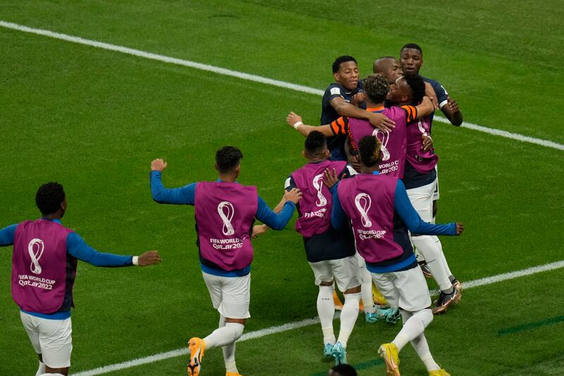 Ecuador's Enner Valencia celebrates with teammates. AP