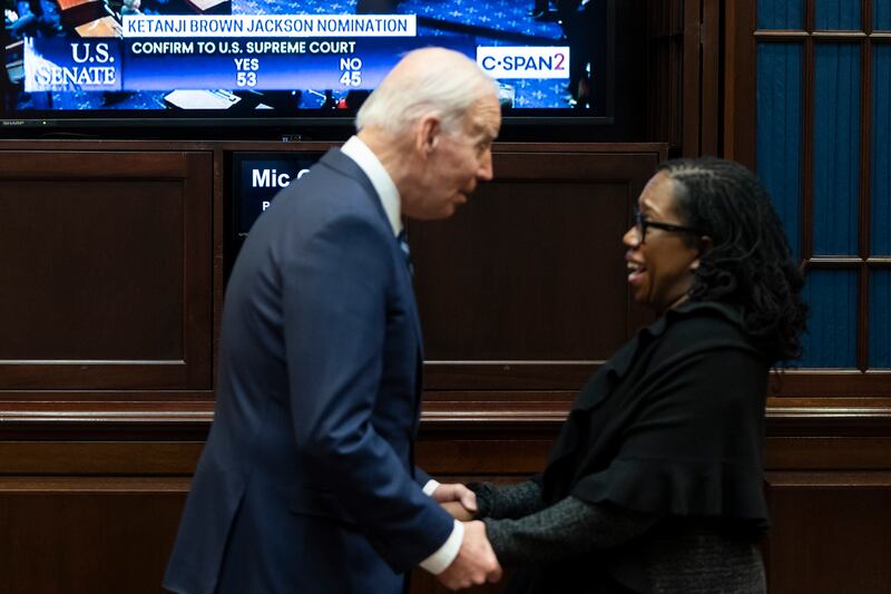 US President Joe Biden hugs Associate Supreme Court Nominee Ketanji Brown Jackson after she passed the 50 vote thresh hold by the US Senate for her confirmation to the Supreme Court at the White House in Washington. EPA