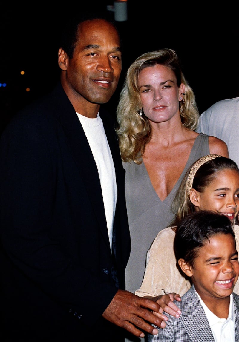Simpson with his ex-wife Nicole Brown and their children at a film premiere in March 1994. Photo: Fred Prouser
