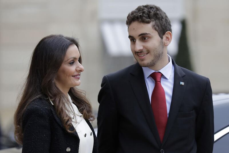 Lara Bachir El Alzm, wife of Lebanese prime minister Saad Hariri, and her son  Houssam leave after a meeting between her husband and the French president at the Elysee Palace on November 18, 2017. Thomas Samson / AFP