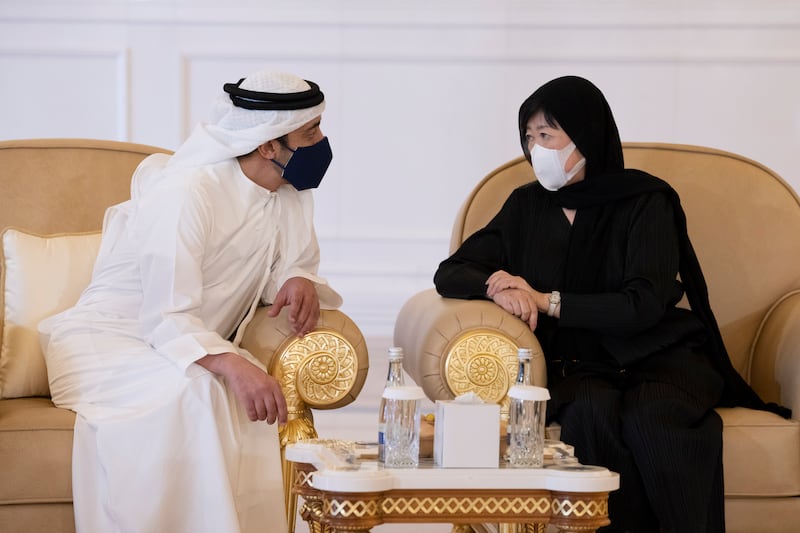 Yuriko Koike, governor of Tokyo, right, offers condolences to the President, Sheikh Mohamed.