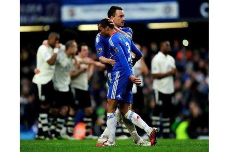 Chelsea's John Terry consoles Ashley Cole after his shoot-out miss against Everton. Jamie McDonald / Getty Images