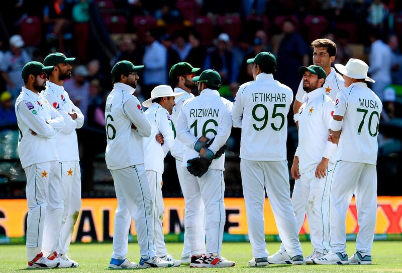 Pakistan's players wait for the review decision during the day two of the second cricket Test match between Australia and Pakistan in Adelaide on November 30, 2019.  -- IMAGE RESTRICTED TO EDITORIAL USE - STRICTLY NO COMMERCIAL USE --
 / AFP / William WEST / -- IMAGE RESTRICTED TO EDITORIAL USE - STRICTLY NO COMMERCIAL USE --
