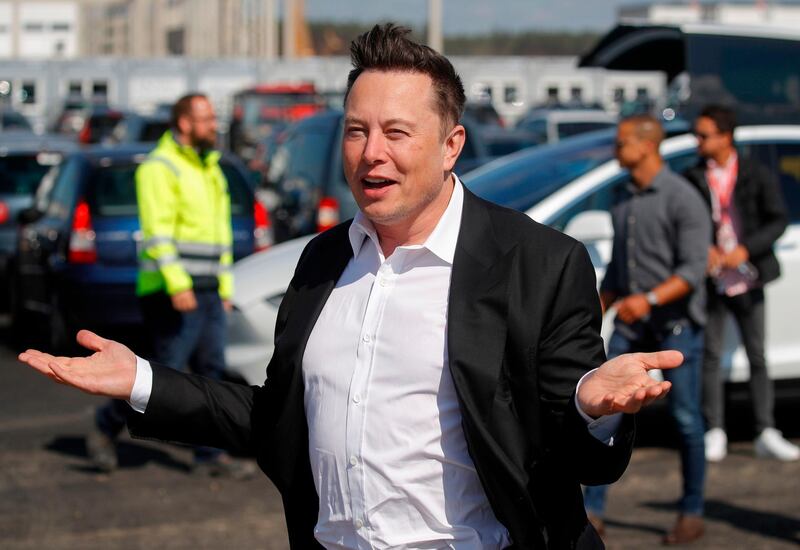 (FILES) This file photo taken on September 3, 2020 shows Tesla CEO Elon Musk gesturing as he arrives to visit the construction site of the future US electric car giant Tesla, in Gruenheide near Berlin. The boom in demand for placing small satellites into orbit has boosted interest in small rockets, but industry players do not think the niche will become a business segment of its own. / AFP / Odd ANDERSEN
