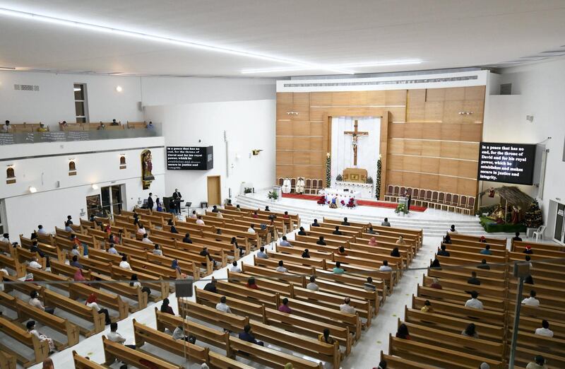 Abu Dhabi, United Arab Emirates - Worshippers must follow safety guidelines at St. PaulÕs Catholic Church in Mussafah. Khushnum Bhandari for The National
